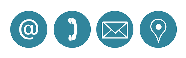 Image featuring icons representing contact information: a phone sign, a mail sign, an @ sign for email, and a location sign, offering various communication options.