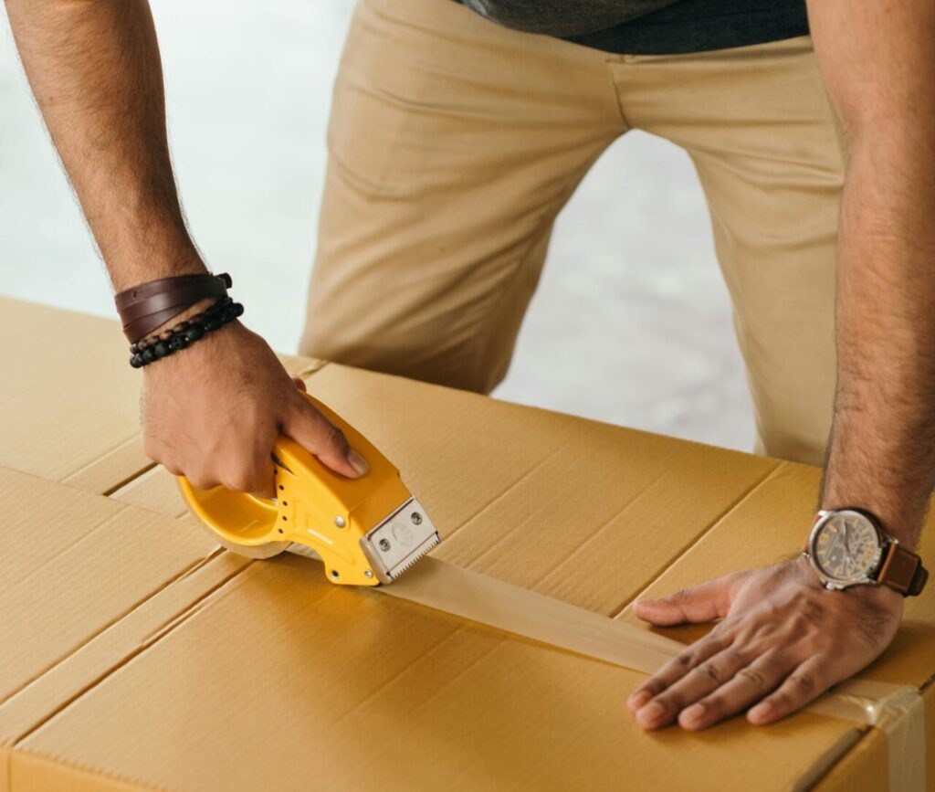 Worker Handling Secure Shipping of an Product